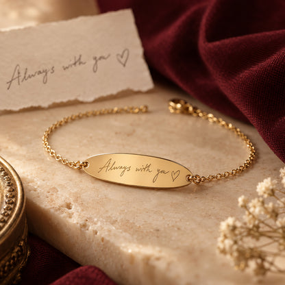 Personal handwriting engraved on a gold bracelet